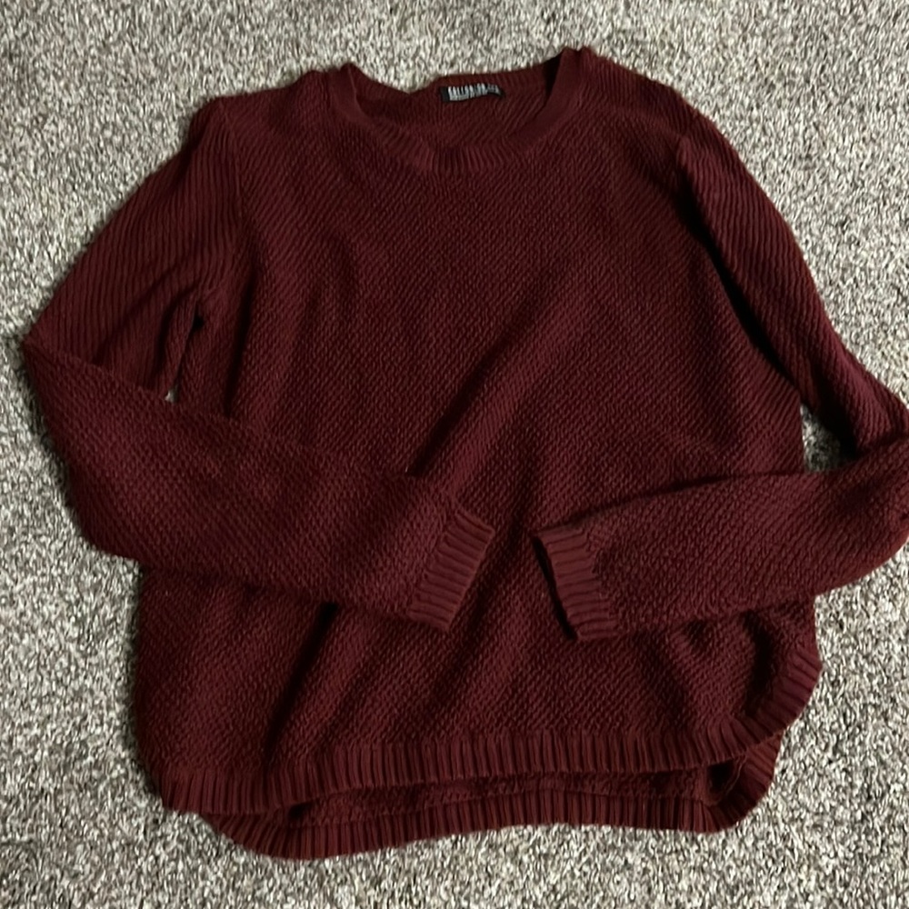 Small cotton on maroon sweater
